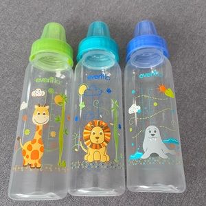 3 evenflow baby bottles that hold 3oz/240ml. Barely used. washed/sterilized.